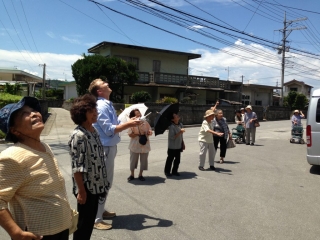 After dancing, the cooking class, and eating at the Shioya Community Center, our new friends enjoy the helicopter camera.